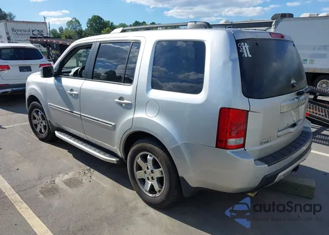 2009 Honda Pilot Touring z USA, uszkodzony, nr VIN 5FNYF38999B006190